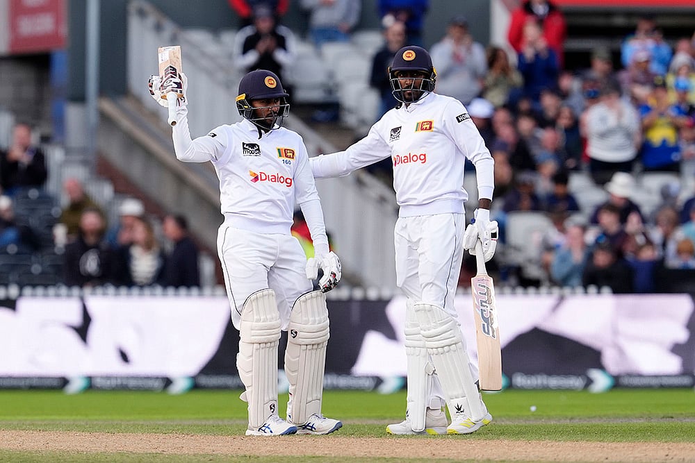 | Photo: Nick Potts/PA via AP : England vs Sri Lanka 1st Test, 3rd Day: Sri Lanka's Kamindu Mendis, left, celebrates his half-century